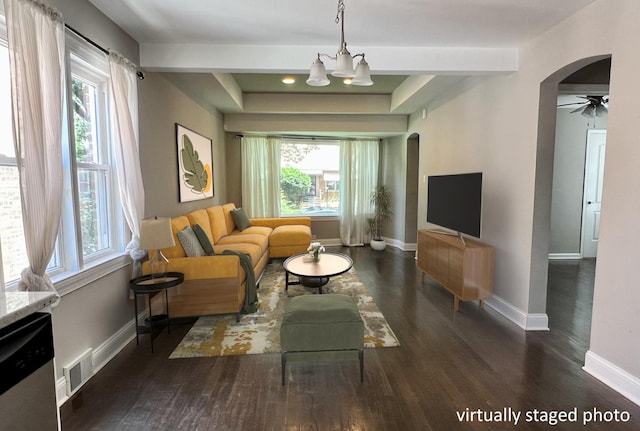 8920 S Jeffery Blvd, Chicago, IL 60617 - living area with arched walkways, plenty of natural light, and wood finished floors