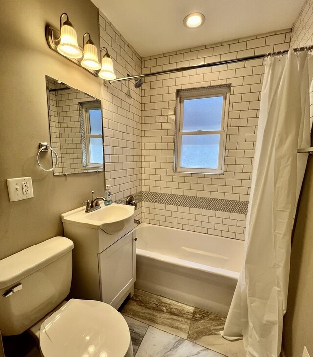 8920 S Jeffery Blvd, Chicago, IL 60617 - full bathroom with vanity, shower / bath combo, and toilet