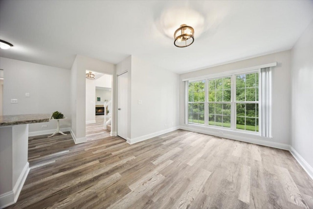 1148 Coldspring Rd Unit 0, Elgin, IL 60120 - unfurnished dining area with wood finished floors and baseboards