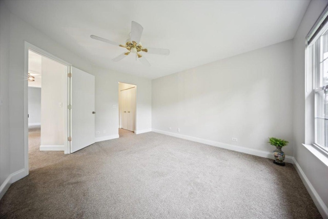 1148 Coldspring Rd Unit 0, Elgin, IL 60120 - unfurnished bedroom featuring light colored carpet, baseboards, and ceiling fan