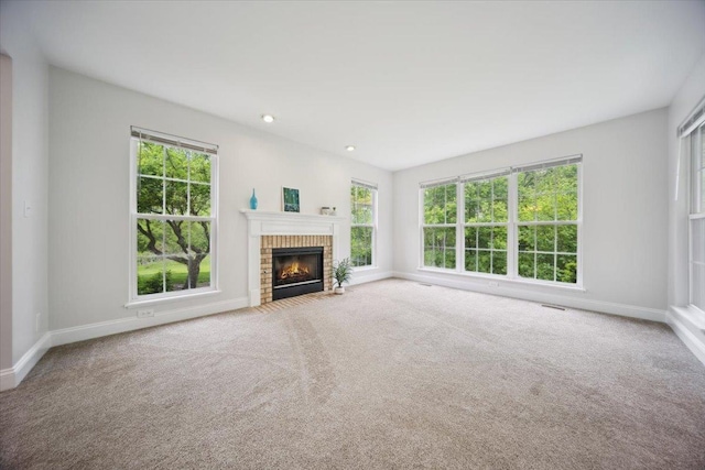 1148 Coldspring Rd Unit 0, Elgin, IL 60120 - unfurnished living room featuring baseboards, carpet flooring, a fireplace, and recessed lighting