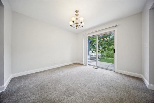 1148 Coldspring Rd Unit 0, Elgin, IL 60120 - carpeted empty room featuring a chandelier and baseboards