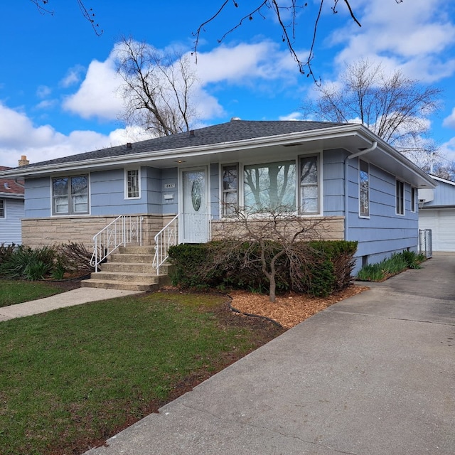 18433 Arcadia St, Lansing, IL 60438 - ranch-style house featuring a front lawn and a garage