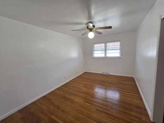 18433 Arcadia St, Lansing, IL 60438 - unfurnished room with ceiling fan, wood finished floors, and baseboards