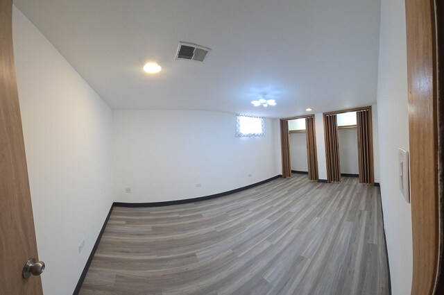 18433 Arcadia St, Lansing, IL 60438 - below grade area featuring light wood-type flooring, baseboards, and recessed lighting