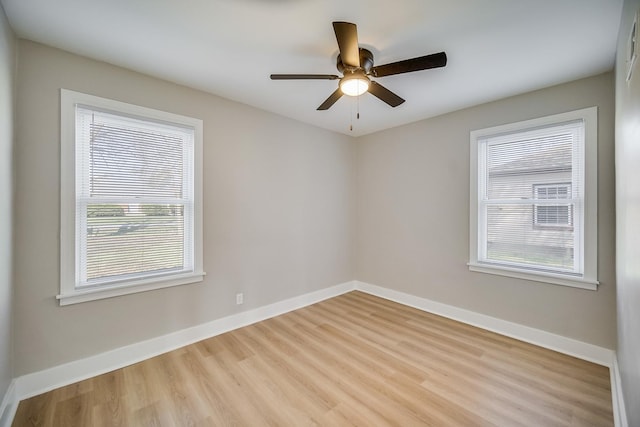 21967 Millard Ave, Richton Park, IL 60471 - empty room featuring wood finished floors, baseboards, and ceiling fan