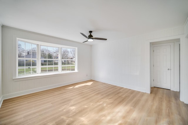 21967 Millard Ave, Richton Park, IL 60471 - empty room featuring light wood-style floors, baseboards, and a ceiling fan