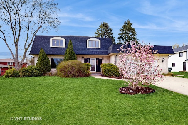 24452 W Blvd Dejohn, Naperville, IL 60564 - view of property with mansard roof, brick siding, driveway, and roof with shingles