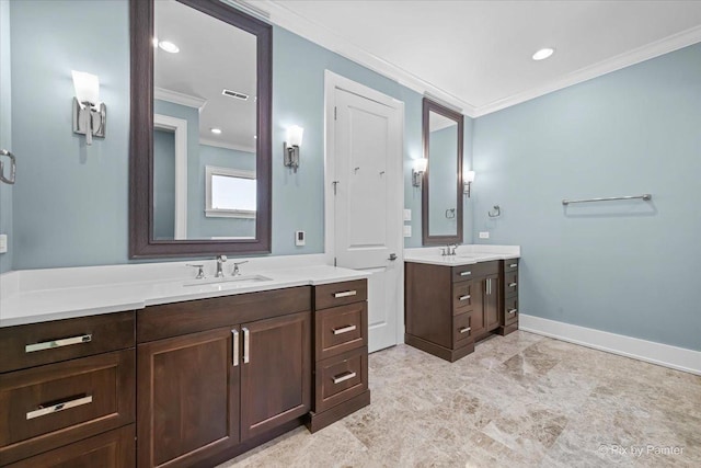 2426 W Warner Ave, Chicago, IL 60618 - bathroom featuring ornamental molding, two vanities, baseboards, and recessed lighting