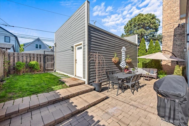 2426 W Warner Ave, Chicago, IL 60618 - view of patio featuring an outdoor living space, grilling area, and outdoor dining space