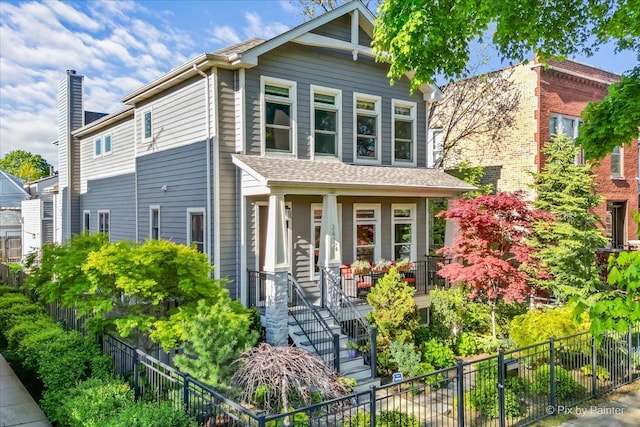 2426 W Warner Ave, Chicago, IL 60618 - view of front of house with covered porch and stairs