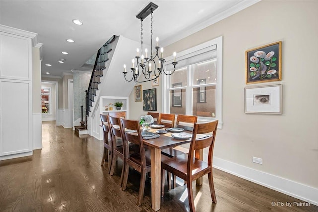 2426 W Warner Ave, Chicago, IL 60618 - dining space featuring ornamental molding, a chandelier, dark wood-type flooring, baseboards, and stairway