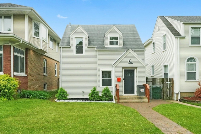 2932 N 75th Ave, Elmwood Park, IL 60707 - view of front facade with a front lawn