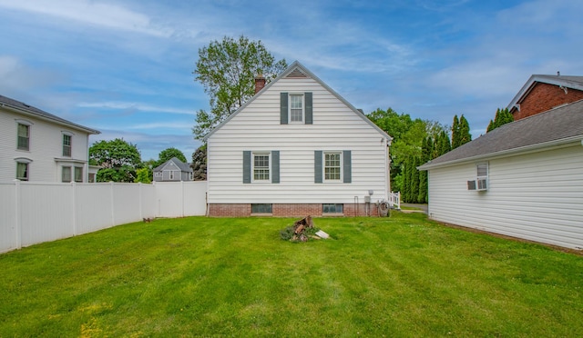 110 N Newton St, Goodland, IN 47948 - rear view of property featuring a chimney and cooling unit