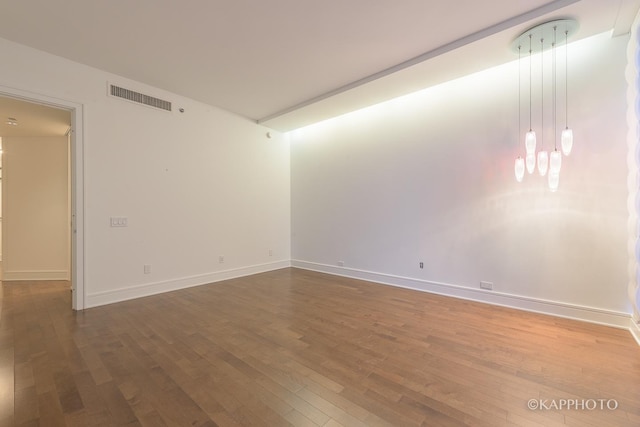 401 N Wabash Ave Unit 39G, Chicago, IL 60611 - spare room with hardwood / wood-style flooring and baseboards