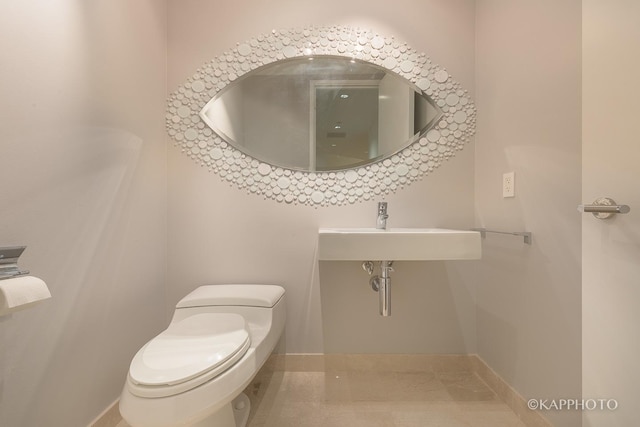 401 N Wabash Ave Unit 39G, Chicago, IL 60611 - half bathroom with toilet and baseboards