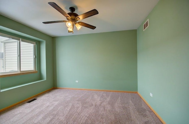 1716 Waters Edge Dr Unit 1716, Minooka, IL 60447 - carpeted empty room featuring a ceiling fan and baseboards