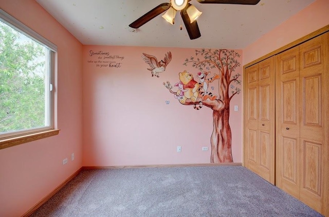 1716 Waters Edge Dr Unit 1716, Minooka, IL 60447 - unfurnished bedroom with carpet floors, multiple windows, a closet, and ceiling fan