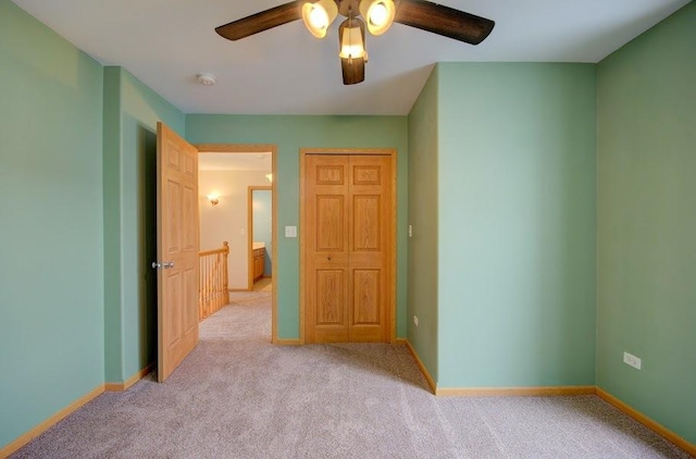 1716 Waters Edge Dr Unit 1716, Minooka, IL 60447 - unfurnished bedroom with carpet floors, ceiling fan, and baseboards