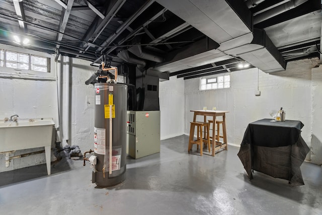 9026 S Colfax Ave, Chicago, IL 60617 - basement featuring water heater, a sink, and heating unit
