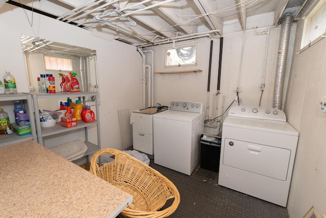 431 Griswold St, Elgin, IL 60123 - washroom with washer and clothes dryer and dark colored carpet