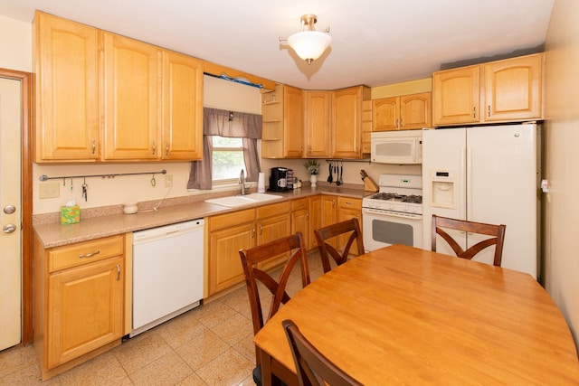 431 Griswold St, Elgin, IL 60123 - kitchen featuring white appliances, a sink, light countertops, light brown cabinets, and granite tiled floors