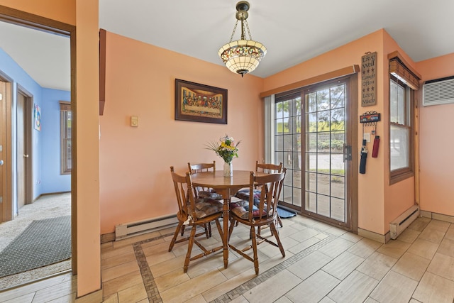 1384 Cunat Ct Unit 1B, Lake In The Hills, IL 60156 - dining space with baseboard heating and baseboards