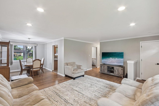 4N221 7th Ave, Addison, IL 60101 - living room featuring wood finished floors, recessed lighting, and ornamental molding