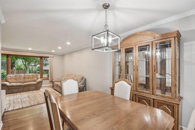 4N221 7th Ave, Addison, IL 60101 - dining space with a chandelier, ornamental molding, wood finished floors, and recessed lighting