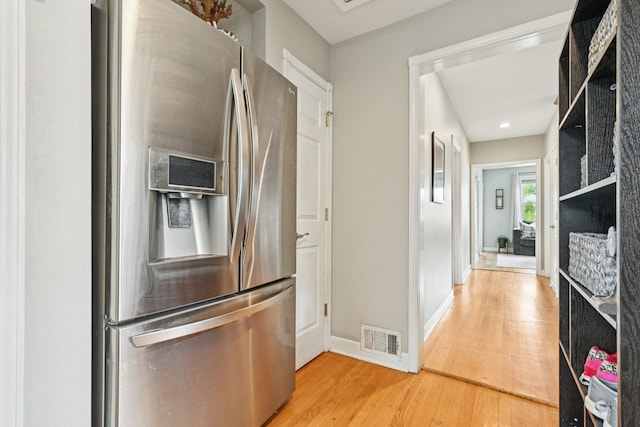 2741 N 75th Ave, Elmwood Park, IL 60707 - kitchen with stainless steel refrigerator with ice dispenser, light wood-type flooring, baseboards, and recessed lighting