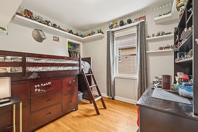 2741 N 75th Ave, Elmwood Park, IL 60707 - bedroom featuring light wood-style floors and baseboards
