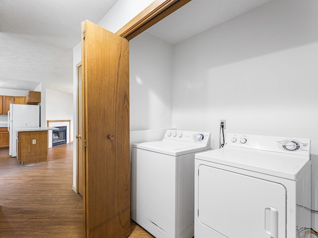 119 SE Brandywine Dr, Poplar Grove, IL 61065 - laundry room with washer and dryer and wood finished floors