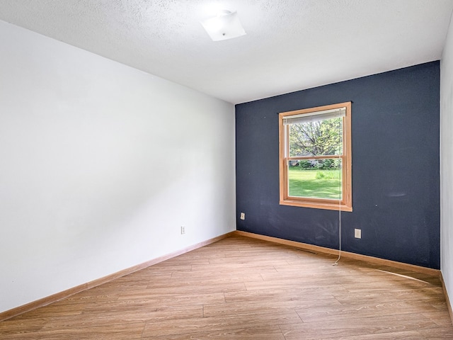 119 SE Brandywine Dr, Poplar Grove, IL 61065 - unfurnished room with wood finished floors and baseboards