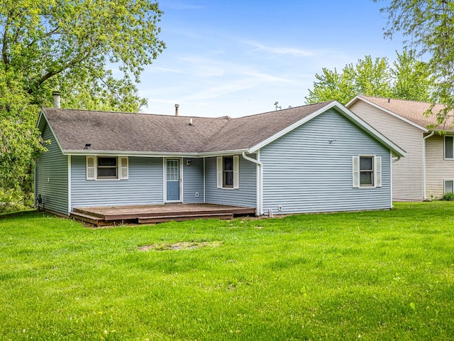 119 SE Brandywine Dr, Poplar Grove, IL 61065 - rear view of house featuring a deck, roof with shingles, and a yard