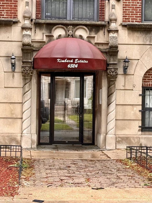 6324 S Kimbark Ave Unit 404, Chicago, IL 60637 - property entrance with stone siding and brick siding