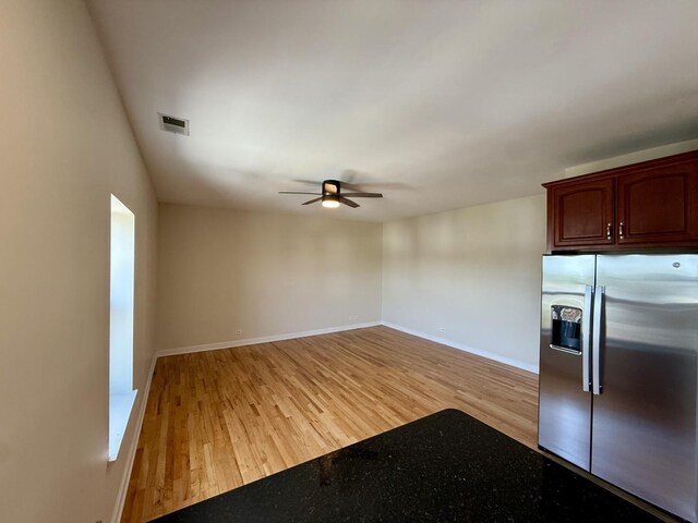 6324 S Kimbark Ave Unit 404, Chicago, IL 60637 - kitchen featuring stainless steel fridge, ceiling fan, and light wood finished floors