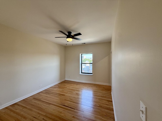 6324 S Kimbark Ave Unit 404, Chicago, IL 60637 - spare room featuring wood finished floors and ceiling fan