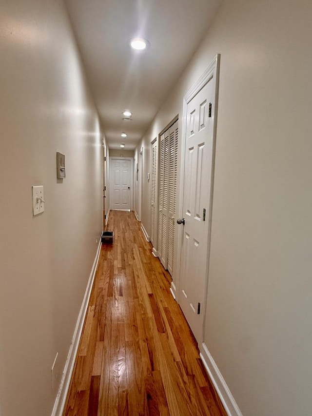 6324 S Kimbark Ave Unit 404, Chicago, IL 60637 - hallway with hardwood / wood-style flooring, baseboards, and recessed lighting
