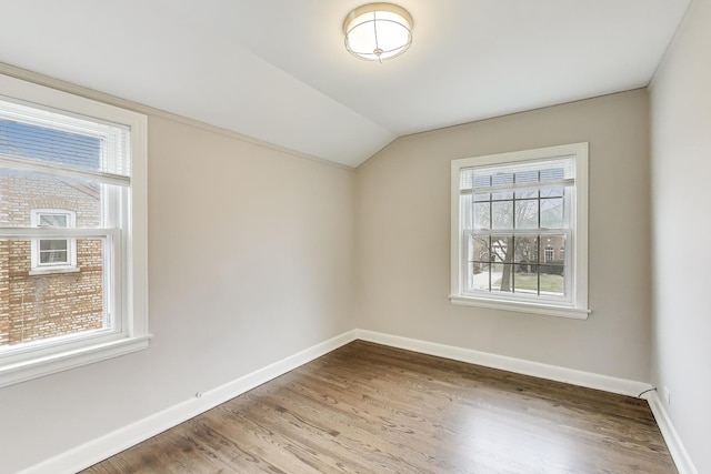 2004 Linden Ave, Park Ridge, IL 60068 - unfurnished room featuring baseboards, vaulted ceiling, and wood finished floors