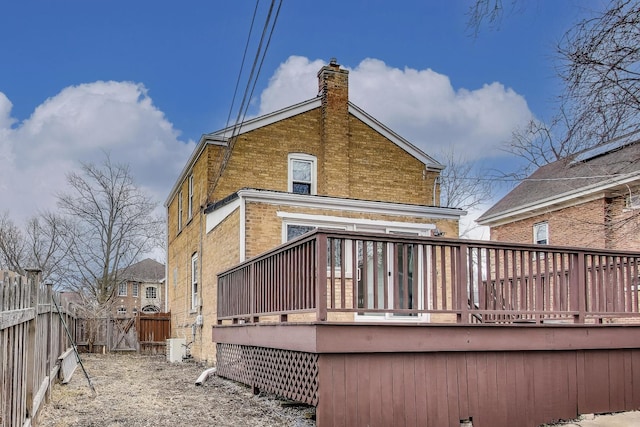 2004 Linden Ave, Park Ridge, IL 60068 - back of house with brick siding, a deck, and a chimney