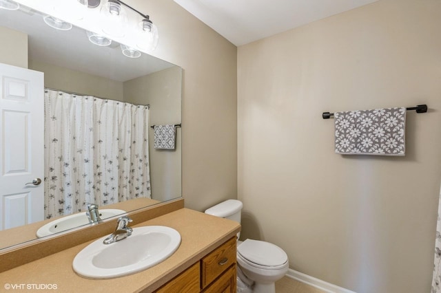 1708 S Fieldstone Dr, Shorewood, IL 60404 - bathroom featuring vanity, toilet, tile patterned flooring, and a shower with shower curtain