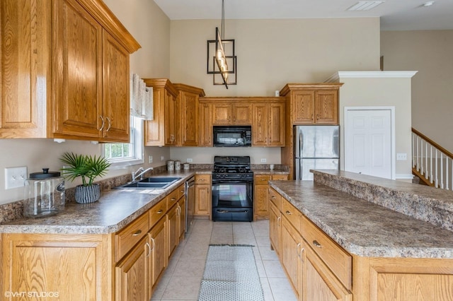 1708 S Fieldstone Dr, Shorewood, IL 60404 - kitchen with black appliances, a sink, light tile patterned floors, brown cabinets, and dark countertops