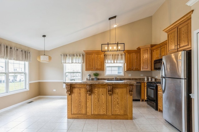 1708 S Fieldstone Dr, Shorewood, IL 60404 - kitchen with black appliances, brown cabinets, vaulted ceiling, and plenty of natural light