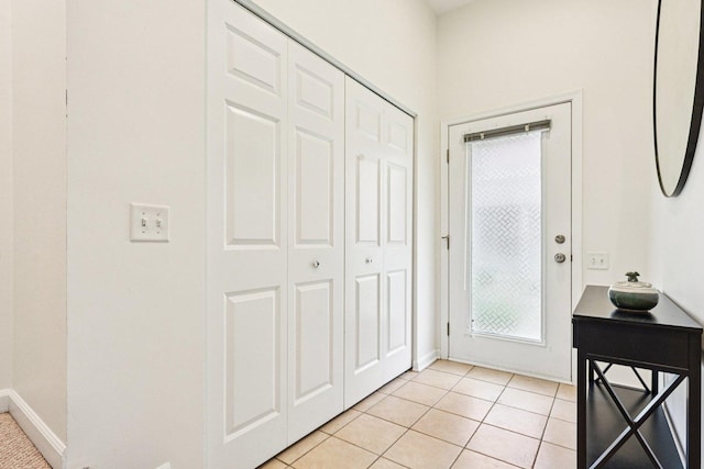 7511 Brown Ave Unit N, Forest Park, IL 60130 - entrance foyer featuring light tile patterned flooring and baseboards