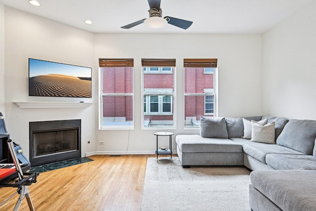 7511 Brown Ave Unit N, Forest Park, IL 60130 - living room featuring wood finished floors, ceiling fan, recessed lighting, and a fireplace with flush hearth
