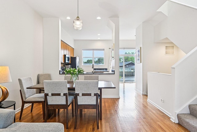 7511 Brown Ave Unit N, Forest Park, IL 60130 - dining room with stairway, light wood-type flooring, and recessed lighting