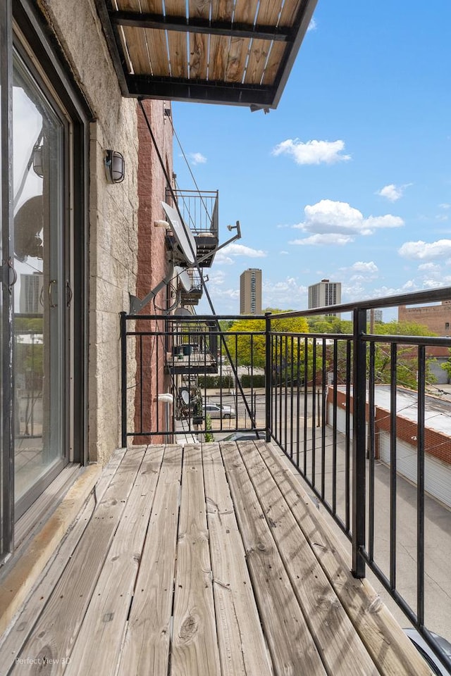 25 E 26th St Unit 4, Chicago, IL 60616 - wooden terrace with central air condition unit