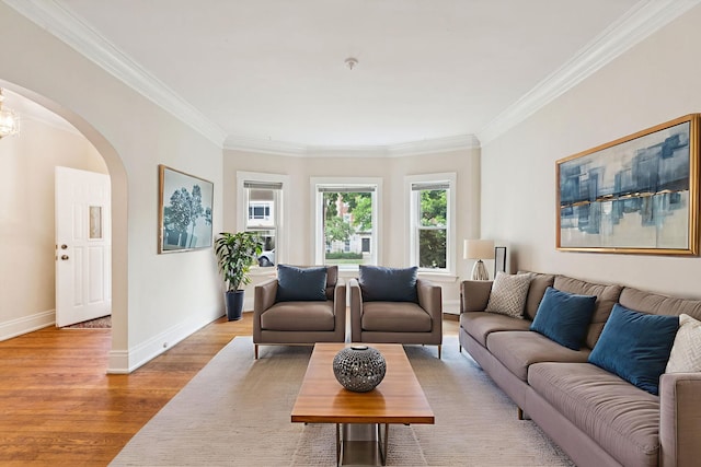 217 S Oak Park Ave, Oak Park, IL 60302 - living area featuring arched walkways, crown molding, light wood-style flooring, and a chandelier