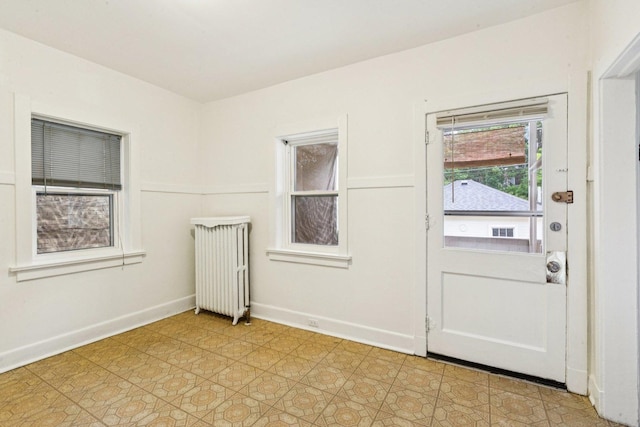 217 S Oak Park Ave, Oak Park, IL 60302 - entryway featuring radiator and baseboards