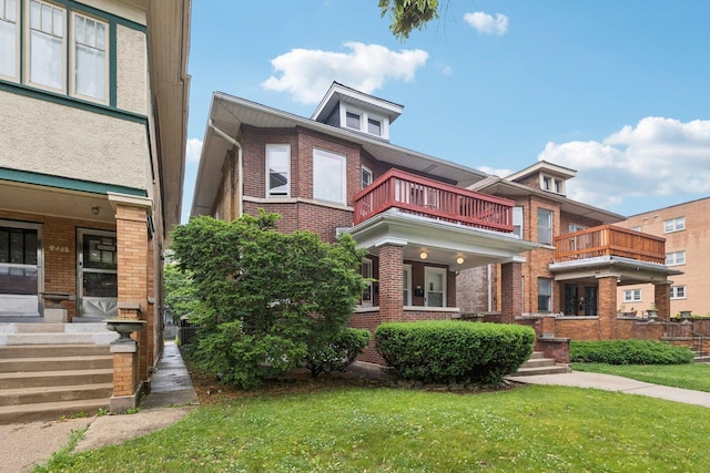 217 S Oak Park Ave, Oak Park, IL 60302 - view of front of home featuring brick siding and a front yard